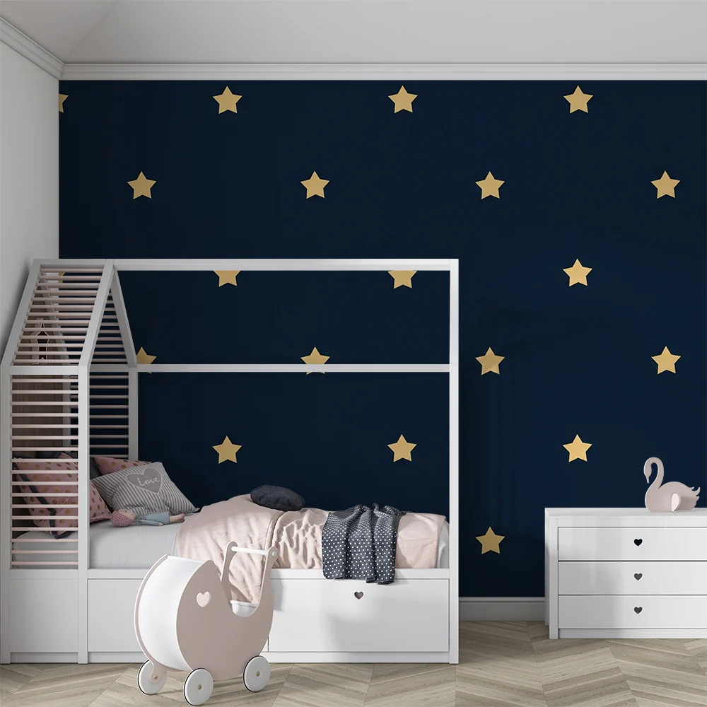 Papel de parede crianç | Estrelas douradas em fundo azul escuro