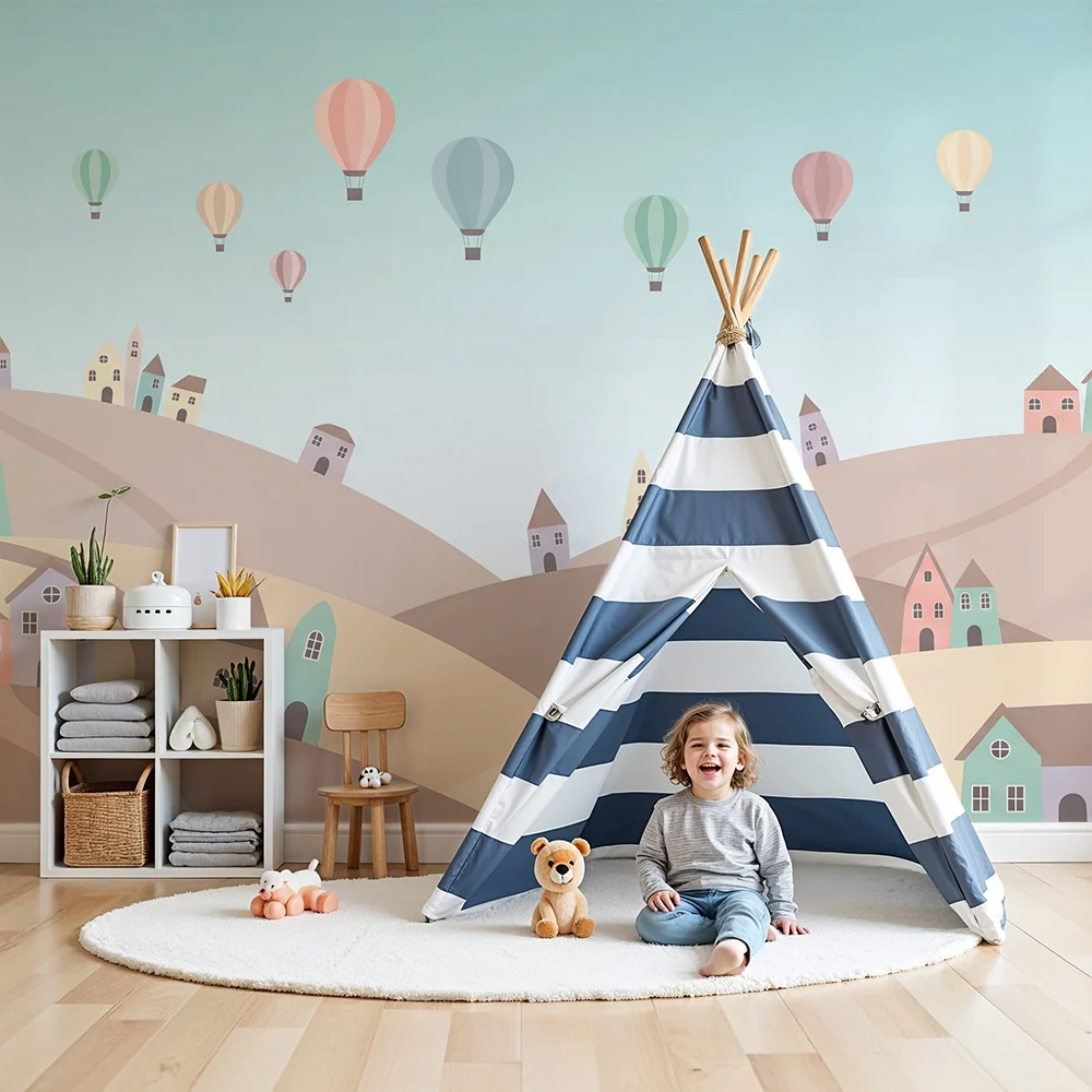 Papel de parede crianç | Paisagem de colinas pastel com casas e balões de ar quente